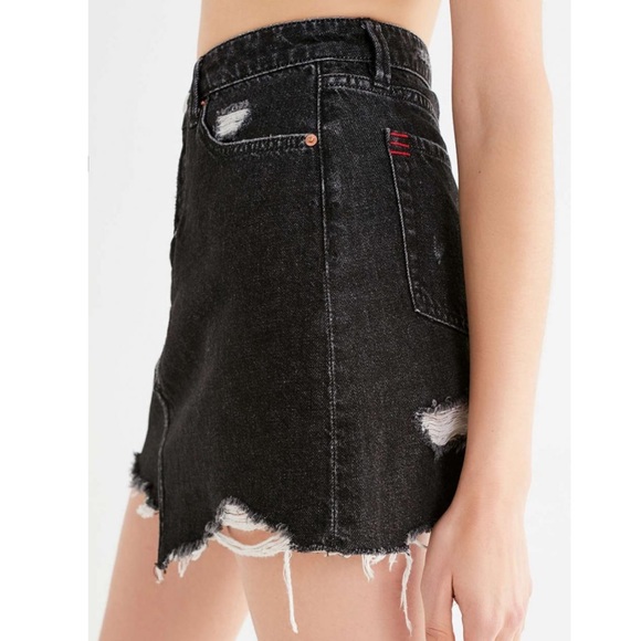 black denim skirt with rips